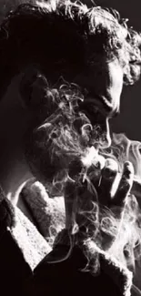 Silhouette of a man exhaling smoke.