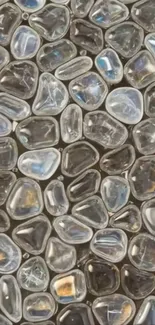 Smooth pebbles forming a natural stone mosaic for mobile wallpaper.