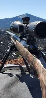 Sniper scope in focus with mountain backdrop, highlighting precision and adventure.