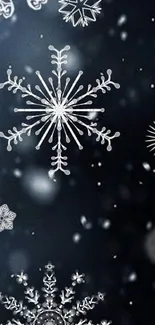 Snowflake design on dark blue background wallpaper.