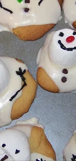 Charming snowman cookies with icing details.