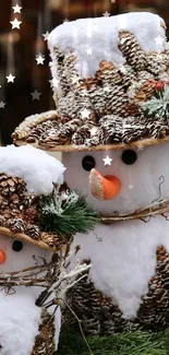 Charming snowman wallpaper with pine cones and festive decor.