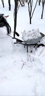 Snowman beside a wheelbarrow in a snowy landscape scene.