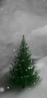 Serene snowy landscape with decorated Christmas tree.