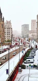 Snowy cityscape with urban architecture and cars in winter.