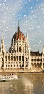 Budapest Parliament covered in snowflakes by the Danube River in winter.