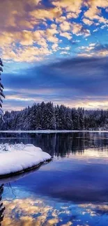 Scenic winter lake with snowy forest and blue sky reflection.