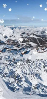 Aerial view of snowy mountains with a clear blue sky.