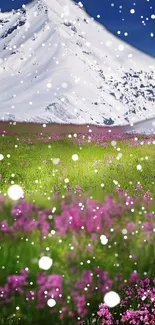 Snowy mountain landscape with pink flowers and falling snowflakes.