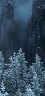 Snowy forest with misty mountain peaks