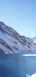 Serene snowy mountain and lake view for mobile wallpaper.