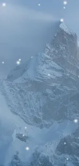 Snowy mountain peak with gentle falling snow.