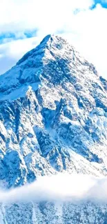 Snow-covered mountain peak under vibrant blue sky.