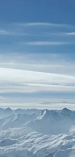 Snowy mountain range under clear blue sky wallpaper.