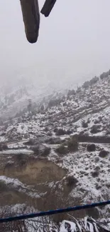 Snow-covered mountain landscape with serene view.