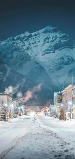 Snowy mountain town at night under a starry sky.