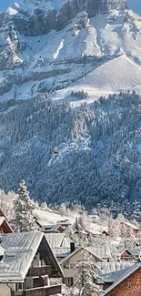 Serene snowy village under a majestic mountain.