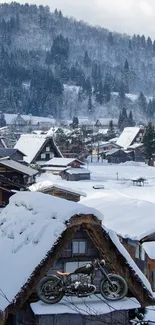 Snowy mountain village with motorcycle on roof.