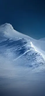 Serene snowy mountain mobile wallpaper with dark blue sky.