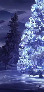 Snow-covered Christmas tree glowing in a serene winter landscape at night.