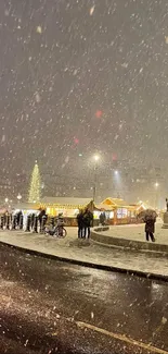 Night cityscape with snowfall and glowing street lights.