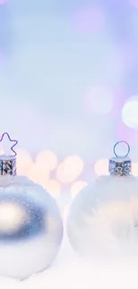 Winter wallpaper with silver ornaments and bokeh lights.