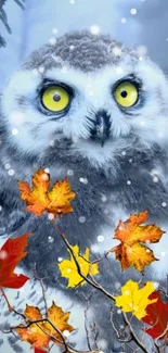 Snowy owl with yellow eyes among autumn leaves and falling snow.