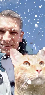 Person with orange cat in snowy weather under a bright blue sky.