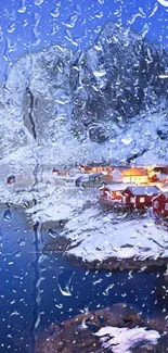 Snowy village with blue mountains and raindrop overlay wallpaper.