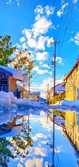 Snowy village with reflection and blue sky wallpaper.