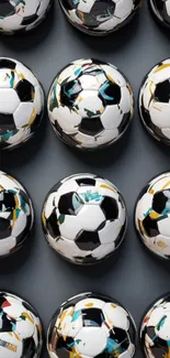 Patterned soccer balls on gray background wallpaper.