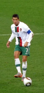 Football player in action on a lush green field during a soccer match.