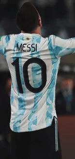 Soccer player celebrating goal, wearing number 10 jersey.