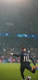 Soccer player taking a free kick in a stadium under bright lights.