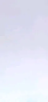 Soft pastel gradient wallpaper with gentle lavender hues.
