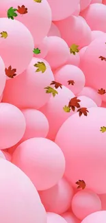 Soft pink balloon wallpaper with pastel spheres.