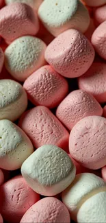 Pink and white marshmallows for sweet-themed mobile wallpaper.