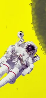 Astronaut floating with lemon slices on yellow background.