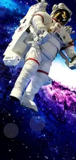 Astronaut floats in vibrant galaxy space wallpaper.