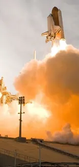 Space shuttle launching with fiery plumes and clear sky background.