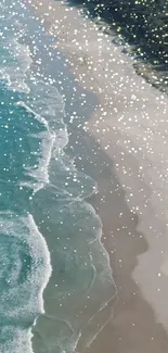 Aerial view of a sparkling turquoise beach with gentle waves and golden sand.