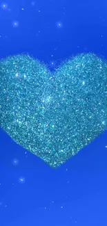 Glittering blue heart on bright blue background wallpaper.