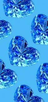 Bright blue heart crystals on a sky blue background wallpaper.