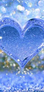 Sparkling blue heart with glitter and bokeh effect.