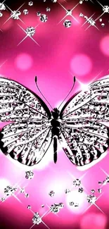 Sparkling butterfly on pink background with diamond accents wallpaper.