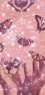 Dreamy pink wallpaper with glowing butterflies and sparkles.