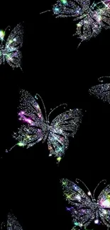 Colorful sparkling butterflies on a dark background.