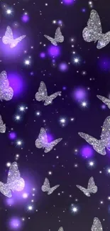 Sparkling butterflies on a violet night sky wallpaper.