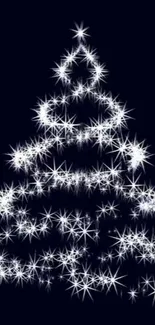 Sparkling Christmas tree silhouette on dark background wallpaper.