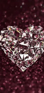 Sparkling diamond heart on maroon backdrop wallpaper.